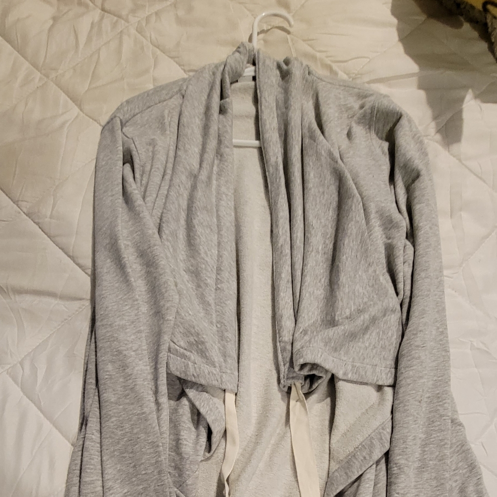 It's a long, grey, active sweater. It's from Old Navy and it's a medium.